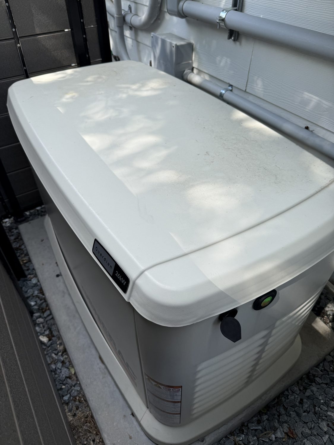 Whole-home Generac standby generator install with conduit, completed